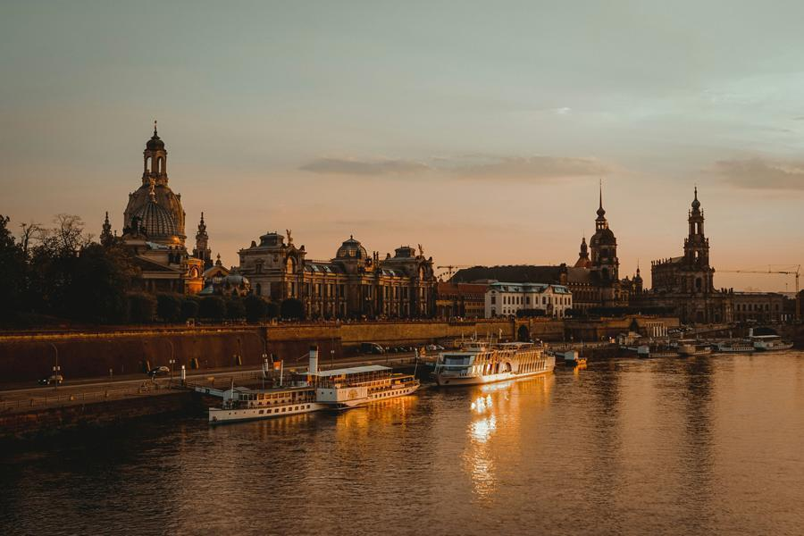 Dresden Elbe - Paddle Steamers in Front of Old Town with Frauenkirche at Sunset Dresden Elbe - Paddle Steamers in Front of Old Town with Frauenkirche at Sunset